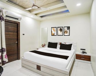 Hotel Arjun International - Lucknow - Kamar Tidur