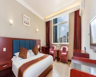 Super 8 by Wyndham Shiyan Beijing Zhong Lu - Shiyan - Bedroom