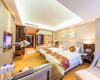 Wuhan Four Seasons Xinbaolai Hotel - Wuhan - Soveværelse