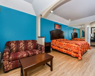 Scottish Inn and Suites Highway Six South - יוסטון - חדר שינה
