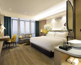 mango crystal hotel - Haikou - Slaapkamer
