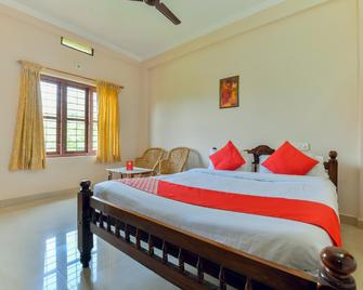 Oyo 22767 Holidays Inn Wayanad - Kenichira - Habitación