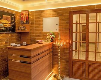 Alora Castle Neyyattinkara Near Kovalam Beach - Kovalam - Front desk