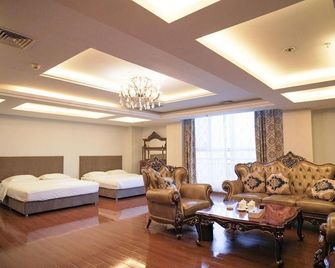 Jinhai Hotel (Yantai Railway Station Wuyue Plaza) - Yantai - Schlafzimmer