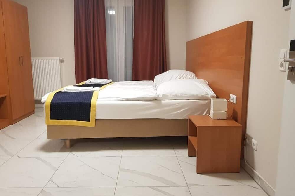 هوتل إميليانا آم بانهوف - فرانكفورت ام ماين - غرفة نوم