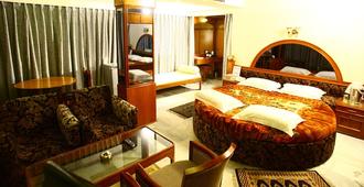 Hotel Sindhuri Park - Tirupati - Slaapkamer
