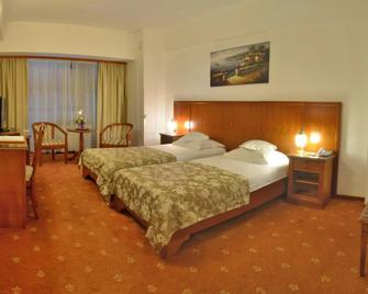 Hotel Emma West - Craiova - Schlafzimmer