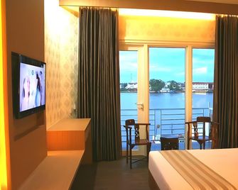 Grand Kartika Hotel - Pontianak - Slaapkamer