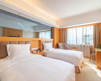 Lotus Huatian Hotel - Changsha - Sovrum