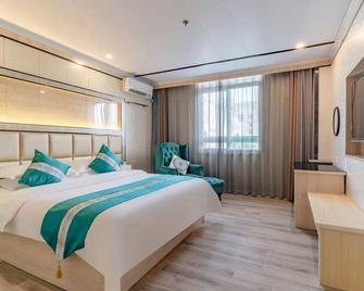 Xinzhiyuan Holiday Hotel (Hefei South High-speed Railway Station) - Che-fej - Ložnice