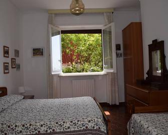 Il Paguro - Calypso - Apartment with independent access and garden - Lavagna - Ložnice
