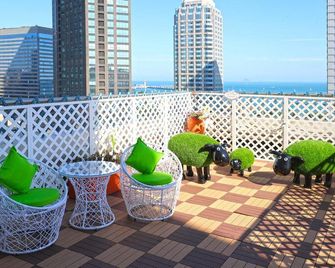 Qingdao Litian Hotel - Qingdao - Balcón