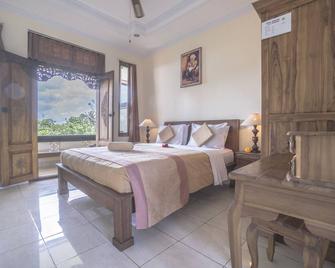 Ubud Sensasi Bungalow - אובוד - חדר שינה