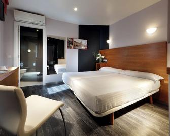 Exe Hotel El Magistral - אוביידו - חדר שינה