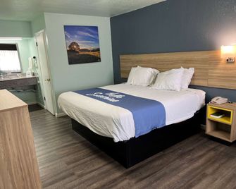 Days Inn by Wyndham Pratt - Pratt - Bedroom