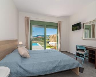 Eora Bungalows - Lithakia - Schlafzimmer