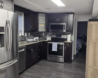 Fully Furnished Basement Suite - Regina - Kitchen