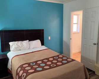 Holiday Motel - קולומבוס - חדר שינה