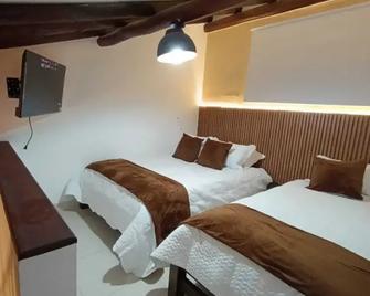 La Toscana Hostel - Villa de Leyva - Bedroom