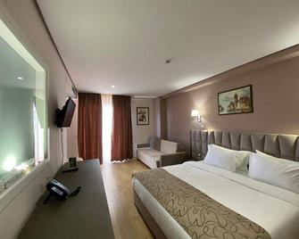 Doanesia Premium Hotel & Spa - טיראנה - חדר שינה
