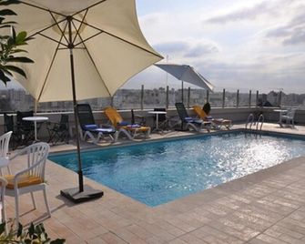 Across Hotels & Spa - Fez - Piscina
