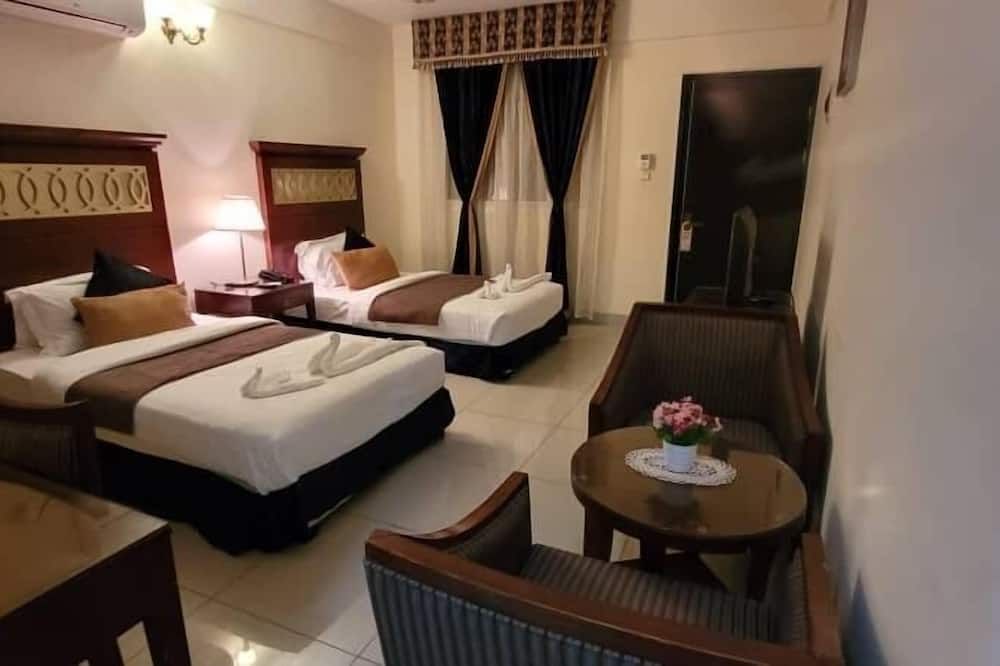 Ras Dika Hotel - ג'יבותי - חדר שינה