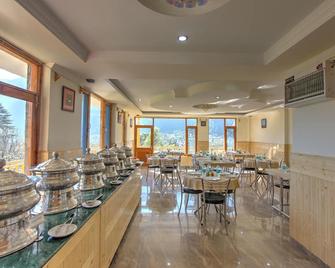 Hotel Mountain Face by Snow City Hotels - Manali - Restaurant