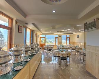 هوتل ماونتن فيس باي سنو سيتي هوتلز - مانالى - مطعم