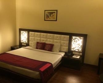 Square 9 Inn - Gurugram - Habitación