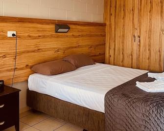 ويلكوم هوم موتل آند أبارتمنتس - روكامبتون - غرفة نوم