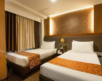 Fernandina 88 Suites Hotel - Manila - Bedroom