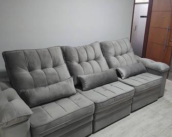 Cozy apartment in a prime location in Goiânia, in the West Sector. - Goiânia - Living room