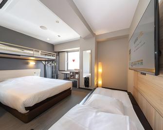Super Hotel Yokkaichi Stn. Front - Yokkaichi - Schlafzimmer