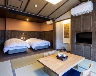 Hitoyoshi Onsen Shirasagiso - Hitoyoshi - Schlafzimmer
