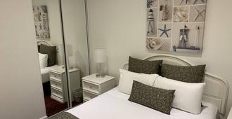 Ensenada Motor Inn and Suites - Glenelg - Camera da letto