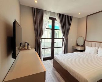 Sunset Marina Hotel - Phu Quoc - Yatak Odası