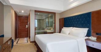 Zhonghan Holiday International Hotel Changde - Changde - Bedroom