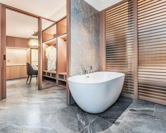 Yashihui Hotel - Hami - Habitación