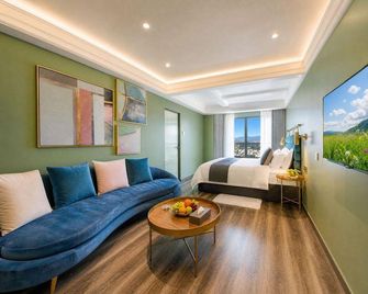 Kunming Ramuja Hotel - Kunming - Habitación
