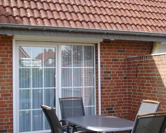 Modern, allergy-friendly vacation home Eiderentenweg incl. annual beach chair - Nessmersiel - Innenhof