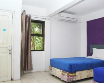 Hotel Griya Surya Solo - Surakarta City - Soveværelse