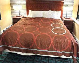 The Villager Motel - Bartlett - Bedroom