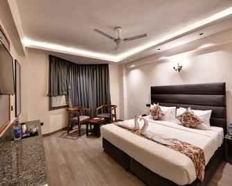 Click Sunburry Hotel Katra - Katra - Ložnice