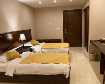 Mosaic City Hotel - Madaba - Schlafzimmer