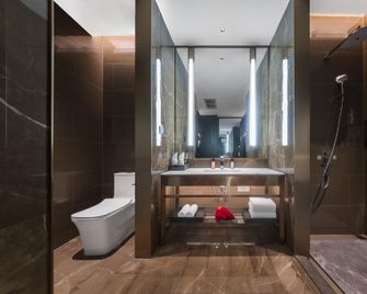 Linxia Babang Shisanxiang Madison Hotel - Linxia - Bedroom
