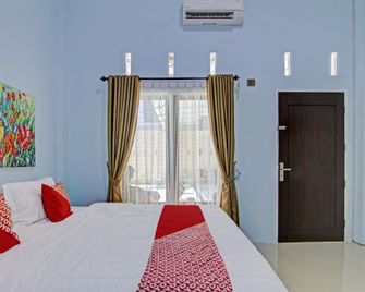 OYO 92562 Dewata Homestay - Pekanbaru - Chambre