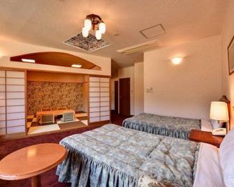 Hotel Monte Rosa - Kamikawa - Schlafzimmer