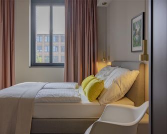 ipartment Leverkusen @HOME by Best Western - Leverkusen - Schlafzimmer