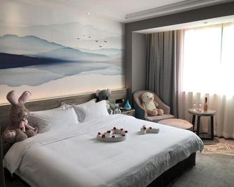Hu Lan Hotel - Putian - Спальня