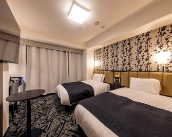 Apa Hotel Kanazawa Chuo - קאנאזוואה - חדר שינה